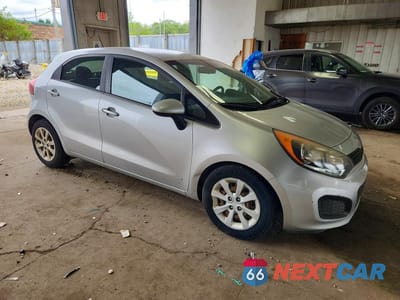 Czwarte zdjęcie samochodu z boku: 2014 KIA RIO LX VIN:KNADM5A38E6358539 - miniatura