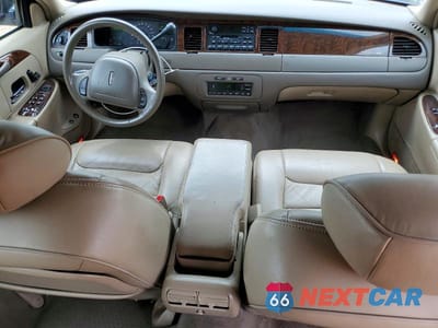 Zdjęcie 8 z 12 samochodu: 1999 LINCOLN TOWN CAR EXECUTIVE VIN:1LNHM81W4XY665208 - miniatura