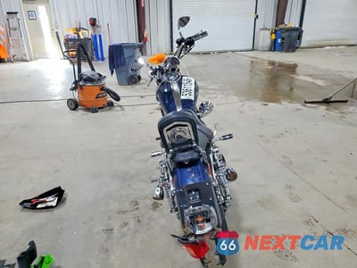 Czwarte zdjęcie samochodu z boku: 2009 HARLEY-DAVIDSON XL1200 C VIN:1HD1CT3149K408728 - miniatura