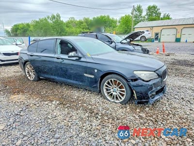 Czwarte zdjęcie samochodu z boku: 2012 BMW 750 XI VIN:WBAKC6C57CC396275 - miniatura