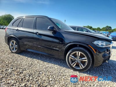 Czwarte zdjęcie samochodu z boku: 2014 BMW X5 XDRIVE50I VIN:5UXKR6C50E0J71698 - miniatura