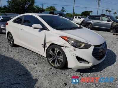 Czwarte zdjęcie samochodu z boku: 2013 HYUNDAI ELANTRA COUPE SE VIN:KMHDH6AE0DU004714 - miniatura
