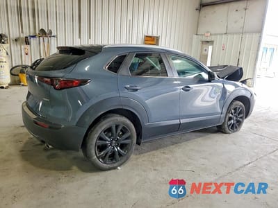 Trzecie zdjęcie samochodu z tyłu: 2022 MAZDA CX-30 PREFERRED VIN:3MVDMBCL8NM407705 - miniatura