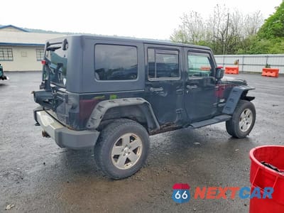 Trzecie zdjęcie samochodu z tyłu: 2010 JEEP WRANGLER UNLIMITED SAHARA VIN:1J4BA5H19AL162283 - miniatura
