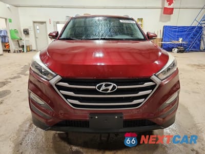 Piąte zdjęcie samochodu w środku: 2016 HYUNDAI TUCSON SE VIN:KM8J33A47GU035910 - miniatura