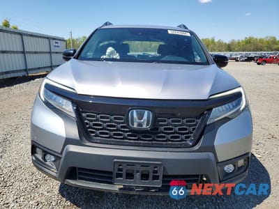 Piąte zdjęcie samochodu w środku: 2020 HONDA PASSPORT TOURING VIN:5FNYF8H97LB014342 - miniatura