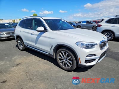 Czwarte zdjęcie samochodu z boku: 2019 BMW X3 SDRIVE30I VIN:5UXTR7C53KLR51330 - miniatura