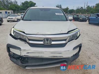 Piąte zdjęcie samochodu w środku: 2021 HONDA PILOT EX VIN:5FNYF5H31MB025493 - miniatura