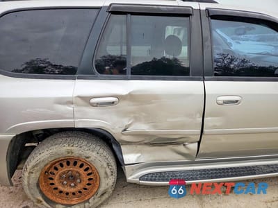 Zdjęcie 11 z 13 samochodu: 2006 GMC ENVOY DENALI VIN:1GKES63M562238722 - miniatura