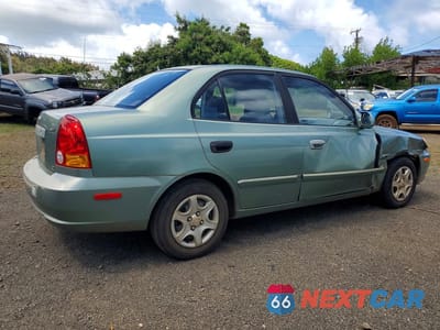 Trzecie zdjęcie samochodu z tyłu: 2003 HYUNDAI ACCENT GL VIN:KMHCG45C33U429984 - miniatura