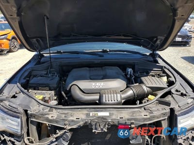 Zdjęcie 12 z 14 samochodu: 2014 JEEP GRAND CHEROKEE OVERLAND VIN:1C4RJECG3EC164519 - miniatura
