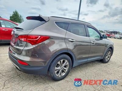 Trzecie zdjęcie samochodu z tyłu: 2014 HYUNDAI SANTA FE SPORT 2.4L VIN:5XYZU3LB7EG214253 - miniatura