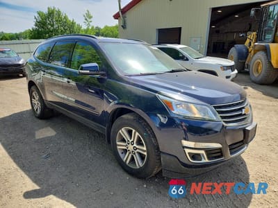 Czwarte zdjęcie samochodu z boku: 2016 CHEVROLET TRAVERSE LT VIN:1GNKVHKDXGJ225711 - miniatura