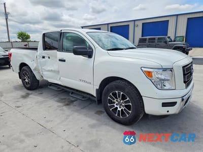 Czwarte zdjęcie samochodu z boku: 2023 NISSAN TITAN SV VIN:1N6AA1EF1PN107797 - miniatura