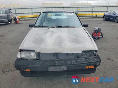 Piąte zdjęcie samochodu w środku: 1988 TOYOTA COROLLA DELUXE VIN:1NXAE82G4JZ527804 - miniatura