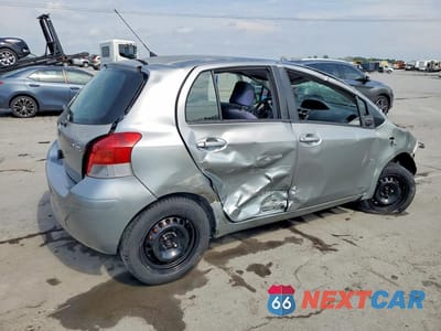 Trzecie zdjęcie samochodu z tyłu: 2010 TOYOTA YARIS BASE VIN:JTDKT4K38A5297988 - miniatura