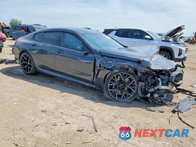 Czwarte zdjęcie samochodu z boku: 2022 BMW M8 VIN:WBSGV0C01NCH35275 - miniatura