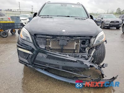 Piąte zdjęcie samochodu w środku: 2013 MERCEDES-BENZ ML 63 AMG VIN:4JGDA7EB7DA207143 - miniatura