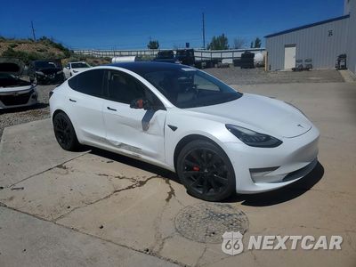 Czwarte zdjęcie samochodu z boku: 2018 TESLA MODEL 3 VIN:5YJ3E1EB4JF098029 - miniatura