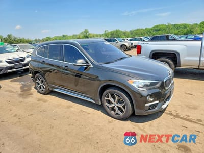 Czwarte zdjęcie samochodu z boku: 2018 BMW X1 XDRIVE28I VIN:WBXHT3C34J5L27008 - miniatura
