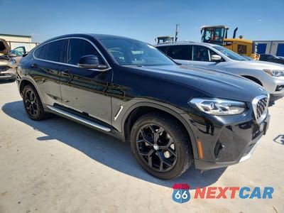 Czwarte zdjęcie samochodu z boku: 2024 BMW X4 XDRIVE30I VIN:5UX33DT03R9W97548 - miniatura