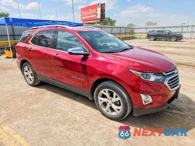 Czwarte zdjęcie samochodu z boku: 2018 CHEVROLET EQUINOX PREMIER VIN:2GNAXVEV5J6275896 - miniatura