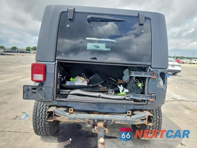 Zdjęcie 6 z 13 samochodu: 2008 JEEP WRANGLER UNLIMITED SAHARA VIN:1J4GA59188L521069 - miniatura