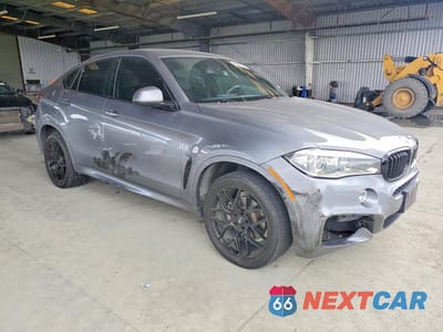Czwarte zdjęcie samochodu z boku: 2015 BMW X6 XDRIVE35I VIN:5UXKU2C53F0N77502 - miniatura