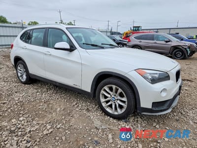 Czwarte zdjęcie samochodu z boku: 2015 BMW X1 VIN:WBAVL1C59FVY31810 - miniatura