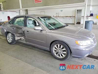 Czwarte zdjęcie samochodu z boku: 2007 HYUNDAI AZERA SE VIN:KMHFC46F27A192462 - miniatura