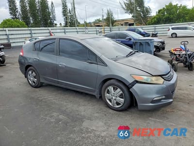 Czwarte zdjęcie samochodu z boku: 2011 HONDA INSIGHT LX VIN:JHMZE2H58BS005201 - miniatura