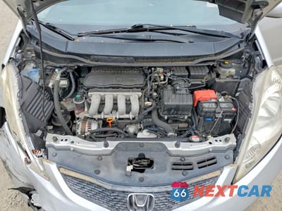 Zdjęcie 12 z 13 samochodu: 2011 HONDA FIT SPORT VIN:JHMGE8H6XBC022532 - miniatura
