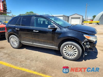 Czwarte zdjęcie samochodu z boku: 2011 FORD EDGE SE VIN:2FMDK3GC7BBB58460 - miniatura