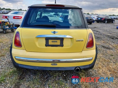 Zdjęcie 6 z 12 samochodu: 2002 MINI COOPER VIN:WMWRC33432TE10162 - miniatura