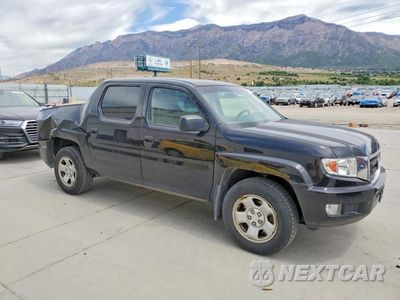 Czwarte zdjęcie samochodu z boku: 2011 HONDA RIDGELINE RT VIN:5FPYK1F28BB451880 - miniatura
