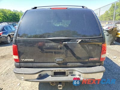 Zdjęcie 6 z 13 samochodu: 2003 GMC YUKON VIN:1GKEK13Z43J337841 - miniatura