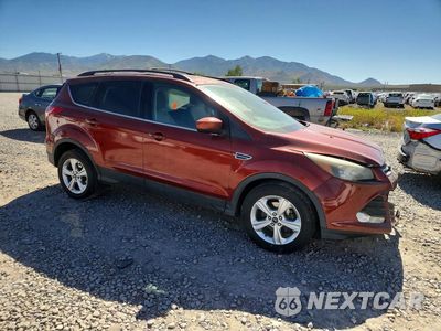 Czwarte zdjęcie samochodu z boku: 2014 FORD ESCAPE SE VIN:1FMCU0GX5EUD02724 - miniatura
