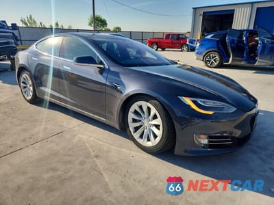 Czwarte zdjęcie samochodu z boku: 2017 TESLA MODEL S VIN:5YJSA1E2XHF183779 - miniatura