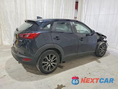 Trzecie zdjęcie samochodu z tyłu: 2017 MAZDA CX-3 TOURING VIN:JM1DKFC71H0146295 - miniatura
