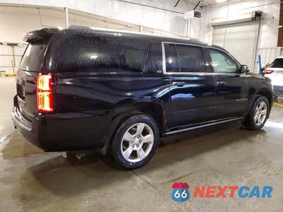 Trzecie zdjęcie samochodu z tyłu: 2016 CHEVROLET SUBURBAN K1500 LTZ VIN:1GNSKJKC8GR130427 - miniatura