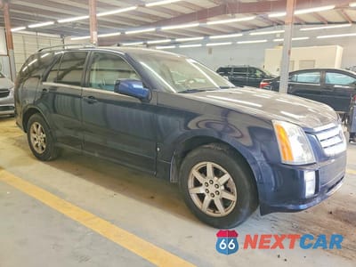 Czwarte zdjęcie samochodu z boku: 2006 CADILLAC SRX VIN:1GYEE637X60222633 - miniatura