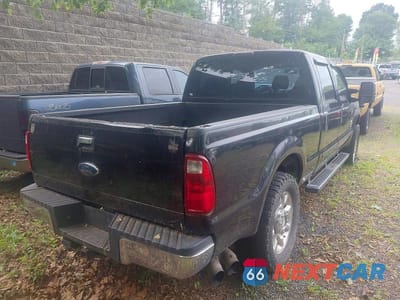 Czwarte zdjęcie samochodu z boku: 2009 FORD F-250 VIN:1FTSW21R59EA73414 - miniatura