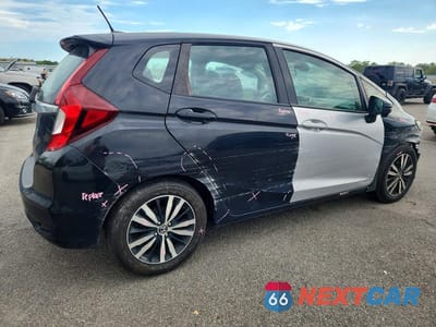 Trzecie zdjęcie samochodu z tyłu: 2018 HONDA FIT EX VIN:3HGGK5H80JM710032 - miniatura