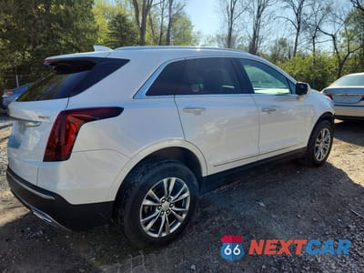 Trzecie zdjęcie samochodu z tyłu: 2022 CADILLAC XT5 PREMIUM LUXURY VIN:1GYKNDR47NZ108510 - miniatura
