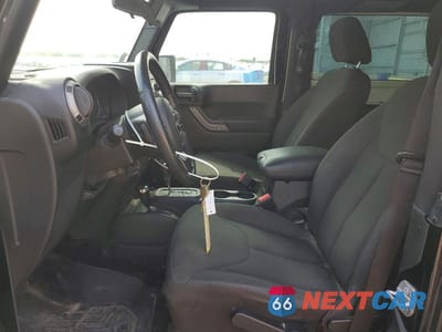Zdjęcie 7 z 12 samochodu: 2016 JEEP WRANGLER SPORT VIN:1C4AJWAG2GL334703 - miniatura