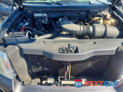 Zdjęcie 11 z 12 samochodu: 2006 FORD F150 VIN:1FTRX14W06FA29060 - miniatura