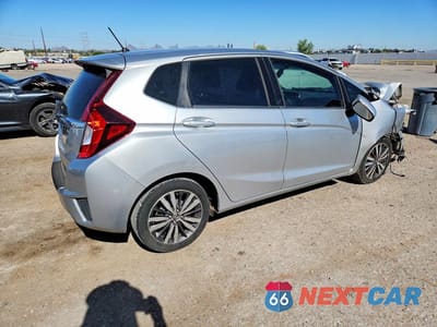 Trzecie zdjęcie samochodu z tyłu: 2015 HONDA FIT EX VIN:3HGGK5H81FM753530 - miniatura