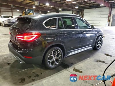 Trzecie zdjęcie samochodu z tyłu: 2017 BMW X1 SDRIVE28I VIN:WBXHU7C31H5H36844 - miniatura