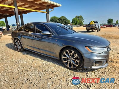 Czwarte zdjęcie samochodu z boku: 2014 AUDI A6 PRESTIGE VIN:WAUHGAFC5EN061244 - miniatura