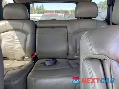 Zdjęcie 10 z 13 samochodu: 2002 CHEVROLET TAHOE K1500 VIN:1GNEK13T52J248499 - miniatura